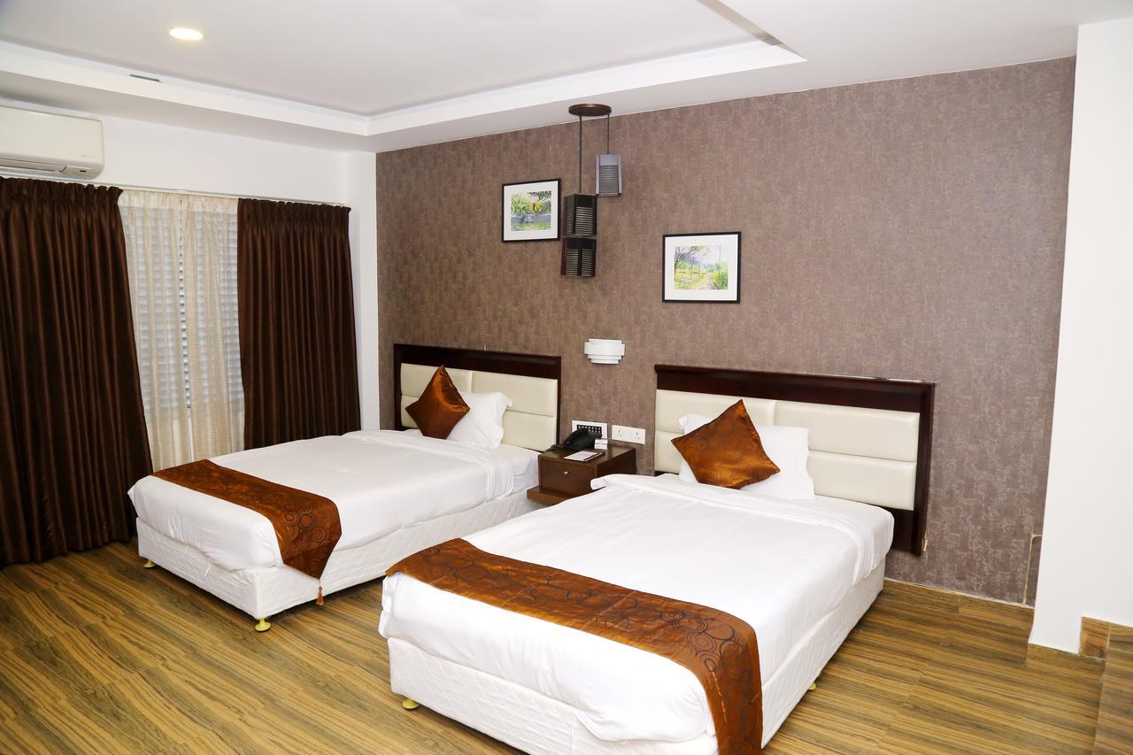 Kga Elite Continental Hotel Tiruvalla Luaran gambar